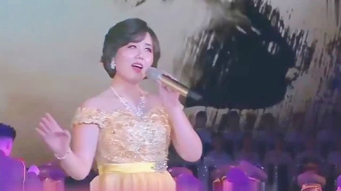 牡丹峰演唱中国歌曲，音乐中的文化韵味与民族情怀，牡丹峰演绎中国歌曲，音乐中的文化韵味与民族情怀